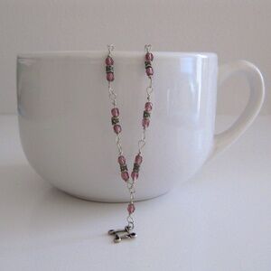 NWOT Silver tone wire and purple amethyst glass bead necklace with cross pendant